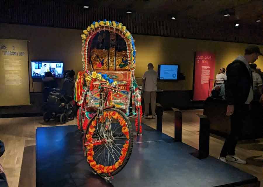 Elaborately decorated rickshaw in the Manchester museum