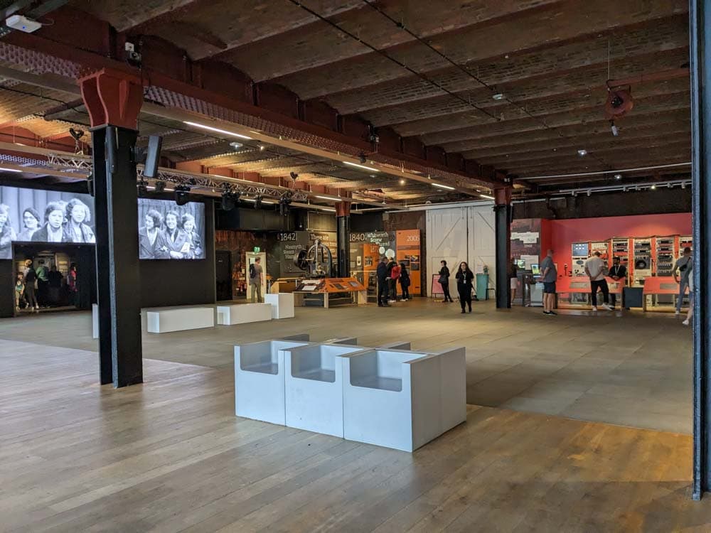 Large space in a museum with information boards