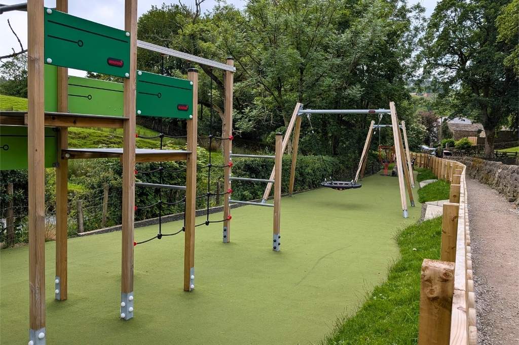Wooden swings and climbing frame
