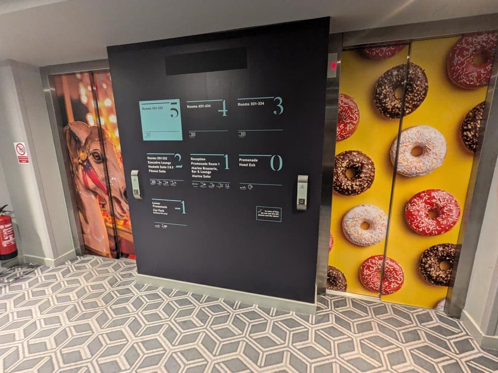 two sets of lifts with donuts photos all over
