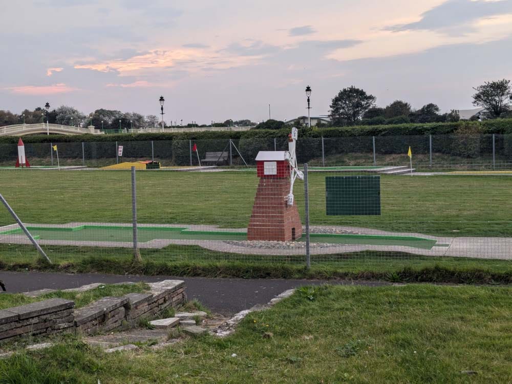 Traditional crazy golf hole with a windmill