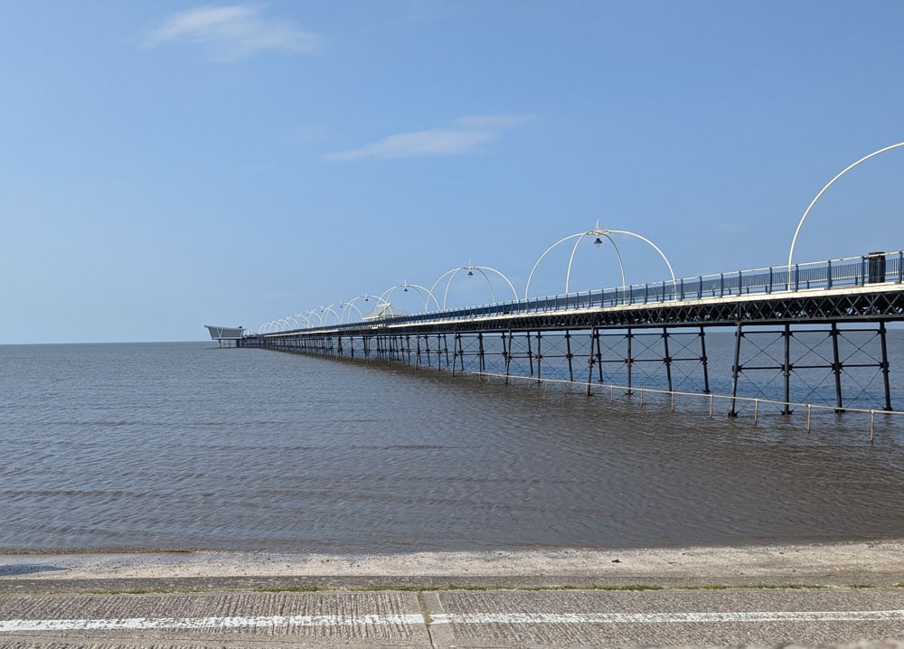 Long, metal pier over the sea
