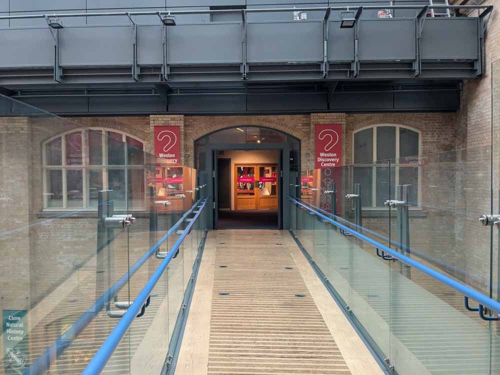 Glass sided bridge to a gallery