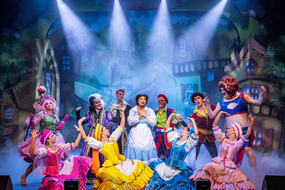 Cast of a panto on stage together