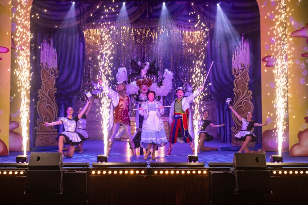 Cast of a panto with fire works