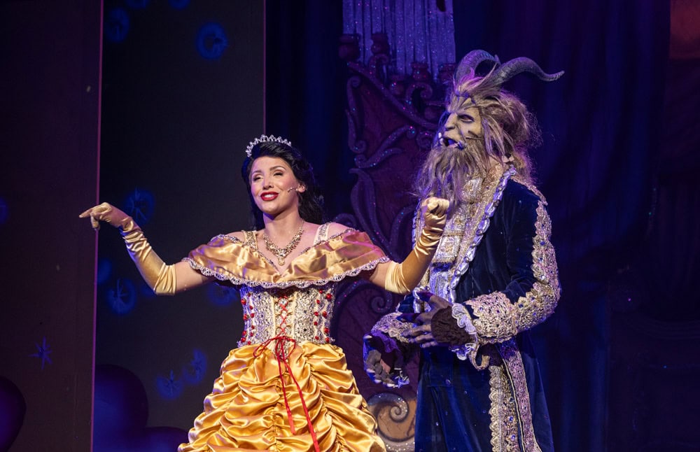 Beauty and the beast on a stage in a theatre