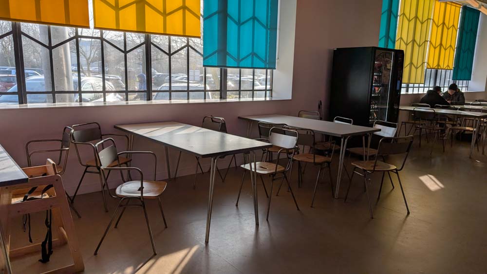 Indoor picnic area with tables and chairs
