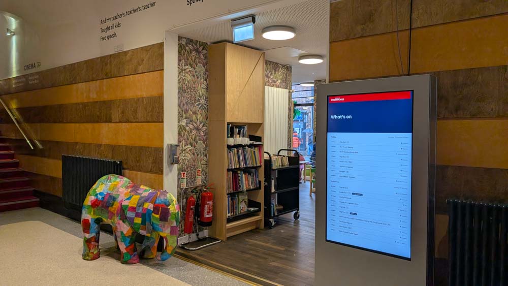 Colourful elephant outside a library