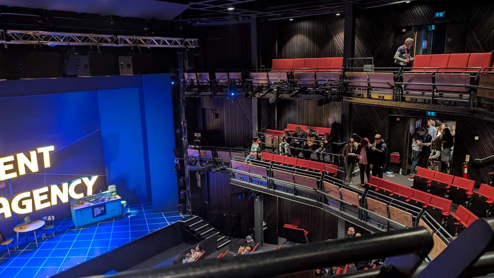 Large theatre with all the seats around three sides