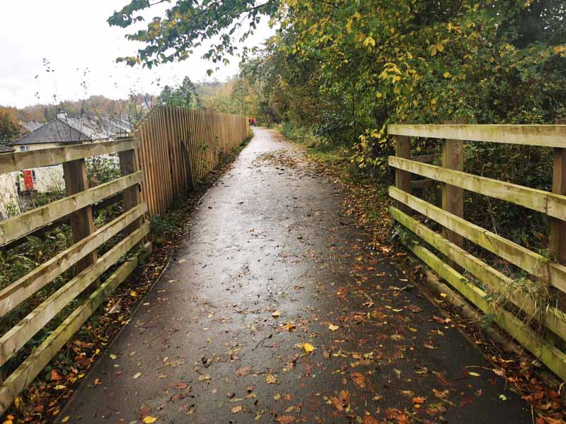 tarmac path with fences on either side