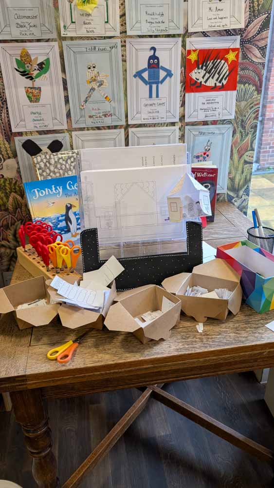 paper and cardboard small boxes of craft supplies